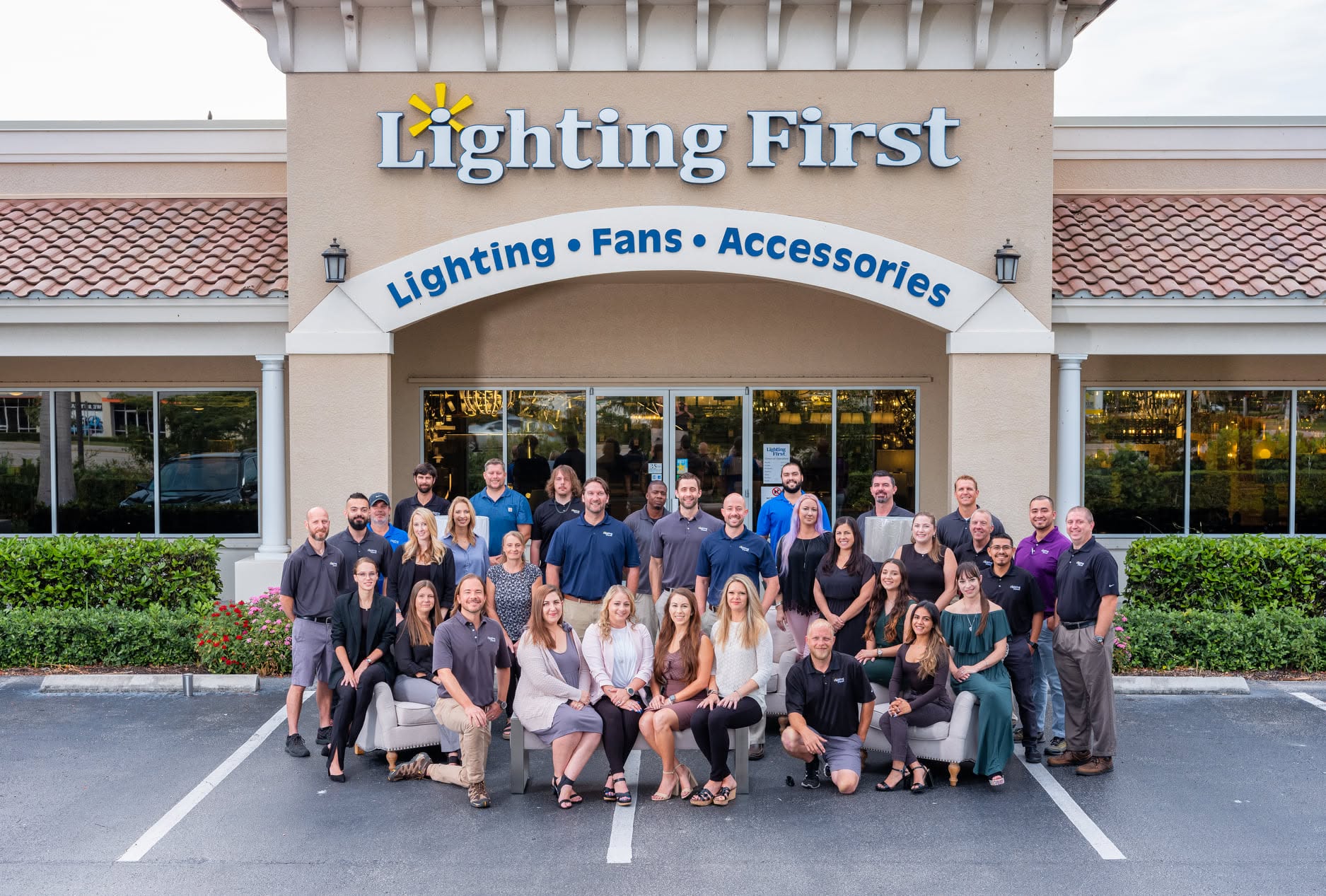 Lighting First team gathered outside a Southwest Florida showroom